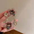 Detailed view of pink fabric flower earrings with sparkling waterdrop crystal pendants. - 8# Silver Earring Post