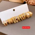 Juego de 12 pendientes de aro dorados vintage con texturas gruesas y trenzadas - Juego de 12 / Dorado