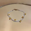 Elegant silver tennis bracelet featuring sparkling white and yellow round zircons - Round Tennis Chain / Yellow