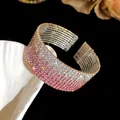 Detailed view of wide multi-row rhinestone elastic cuff bracelet with pink gradient - Silver Tone Pink Gradient