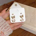 14K gold plated butterfly and bow stud earrings set with sparkling zircon details - 3 Pairs Set / Gold