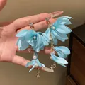 Elegant blue fabric flower tassel earrings with white pearls and sparkling zircon accents - Green