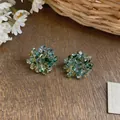 Handcrafted teal glass bead flower cluster stud earrings for a fresh chic summer look - Pale Green