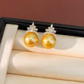 Elégantes boucles d'oreilles perles dorées plaquées or 18k avec détails en zircone. - Or Champagne (Boucles d'Oreilles Clous)