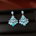 Close-up of luxury water-drop zircon chandelier earrings in black jewelry box - Silver-Blue Style (HE34194) / Blue