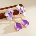 Close-up detail of elegant purple and white drip oil floral earrings with golden metal accents - Steel Post Style (HE34222) / Purple