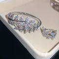 Elegant silver-toned jewelry set featuring a leaf-shaped zircon ring and bangle - Leaf Bangle Ring Set (HB5632-HR3291) / Silver