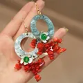 Detailed view of Bohemian resin earrings with red coral tassels and white flowers. - Coral Tassel Ear Hook / Blue-Red