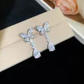 Elegant silver butterfly earrings featuring sparkling pear-cut zircon dangles for women - 20# (HE31465)