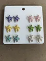 Set of six pairs of colorful starfish stud earrings on a white display cardboard card - Multicolor (9# Silver Needle)