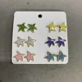 Six pairs of colorful star-shaped stud earrings in vibrant dopamine colors on display card - Multicolor (15# Silver Needle)