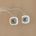 Detail of French vintage square earrings with green stone and gold plating finish. - Square Geometric Style (Gold) / Blue