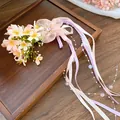Detail view of a Moriy-style flower hair clip with pastel ribbons and pearly beads - Pink / Duckbill Hair Clips