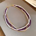 Detail of multi-layer vintage necklace with white pearls, purple beads, and gold chain - Multi-layer Clavicle Chain / Purple White Gold