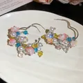 Detailed view of sweet heart-shaped hoop earrings with colorful beads and pearls for women - Silver Post Heart Artificial Pearl Flower Style / Colorful