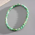 Detailed view of fresh green and white crystal beaded necklace with silver magnetic clasp - Necklace / Green-Coffee