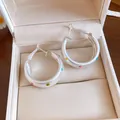 Detail of brushed silver hoop earrings featuring colorful dopamine polka dots in a gift box - Brushed Polka Dot Hoop (HE34162) / Silver - Rainbow