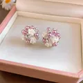 Close-up of French floral cluster stud earrings with purple pearls and crystals - Flower Cluster Style (HE34161) / White Purple