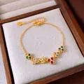 Bracelet doré élégant orné de grappes de fleurs colorées et de zircons scintillants - Or (Zirconium Multicolore)
