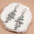 Orecchini a nappina a forma di cuore con elementi in vetro blu cangiante di lusso - Orecchino a Cuore con Nappina / Argento-Blu