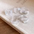 Set of clear minimalist resin rings with various geometric shapes on linen background - Minimalist Niche Style / 5 Pieces / Clear