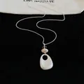 Minimalistische zilveren lange ketting met druppelhanger en verstelbare ketting dames - Geometrische Combo Hanger / Zilver-Ovaal