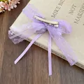 Detailed back view of a purple lace bow hair clip with a silver duckbill clip - Duckbill Hair Clips / Single Piece / Purple