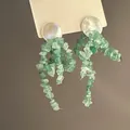 Detail view of green natural stone chip tassel earrings with pearlescent shell studs. - 碎石流苏 (3#)