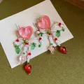 Detail of handmade pink heart earrings with beaded bow design and colorful beads - Heart Bow Tassel Style / Colorful