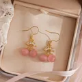 Elegant pink cat eye stone cherry drop earrings with marquise zircons in a gold finish - Earring Hooks / Pink Gold