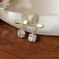 Close-up of elegant butterfly drop earrings with cubic zirconia and shell petals. - Square Zirconia Butterfly Pendant (2#) / Gold