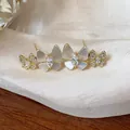 Elegant close-up of 14k gold plated butterfly stud earrings with zircon and shell - Double Butterfly Style (3#) / Gold