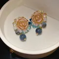 Detailed view of French retro resin rose earrings with pearls and blue crystal beads - Flower Style (HE33235) / Blue-Pink