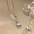 Close-up view of elegant cloud pendant necklace featuring glass raindrops and pearl details - Pearl Splicing Style (HN11632)