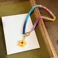 Colorful glass beaded necklace with yellow flower pendant for a spring beach vacation - Yellow Multicolor Necklace