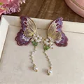 Elegant embroidered purple butterfly earrings with long pearl tassels and gold details - Silver Earring Post - Gold - Purple
