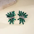 Detailed view of green firework rhinestone stud earrings with sparkling silver accents - Irregular Fireworks Style (HE34070) / Green