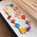 Vista dettagliata della collana di perle di conchiglia colorata e stella marina. - Collana-Multicolore