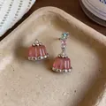 Asymmetric pink resin pudding earrings featuring colorful zircon stones in lifestyle setting - Asymmetric Earrings / Pink