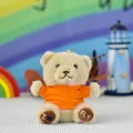 Small beige plush teddy bear keychain wearing an orange t-shirt with I FLY embroidery. - Bead Chain Style / 12cm High / Orange
