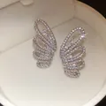 Close-up of sparkling zircon butterfly wing ear clips presented in a luxury white box - Wing Style Pair / 3.2*2cm / Silver