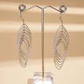 Detail of silver-toned multi-layer oval drop earrings with elegant textured finish - Silver Multi-Layer Nested Oval Style (2#)