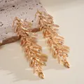 Detail view of elegant vintage gold-toned branch-shaped long dangle earrings - Vintage Branch Leaf Pendant (9#)