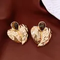 Detailed view of vintage gold hammered leaf earrings with teardrop tiger eye gemstones - Gold Leaf Dark Brown Teardrop Gem Style (11#)