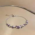 Élégant bracelet argenté orné de zircons violets et clairs en taille marquise. - Bracelet Géométrique Goutte d'eau / Argent Violet