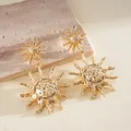 Close-up detail of vintage golden sun-shaped drop earrings featuring hammered texture - Sunburst Shape Pendant (25#)