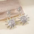 Close-up of vintage sun-shaped drop earrings with a textured silver metallic finish. - Sunburst Texture Double-Layer Drop Style (26#)