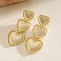 Elegant vintage gold-tone tiered heart dangle earrings with textured grid finish - Three-Layer Gradient Heart Pendant (56#)