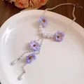 Detailed view of sweet style necklace with pearls and purple chiffon flowers - Purple