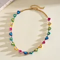 Detailed view of a vibrant dopamine-style heart necklace with multi-colored crystals. - Multicolor (Short)
